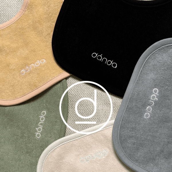 Soft cotton bibs arranged with care.